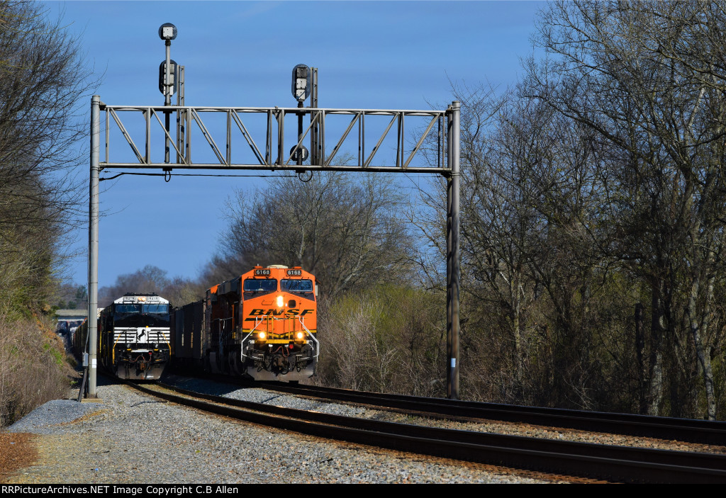 Coal Train Overtakes Junk Train